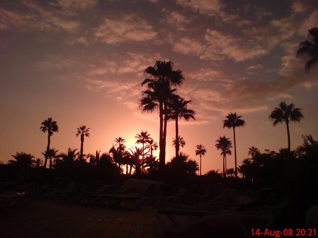 Sunset_Sky__with_sunglass_by_Source90.jpg
